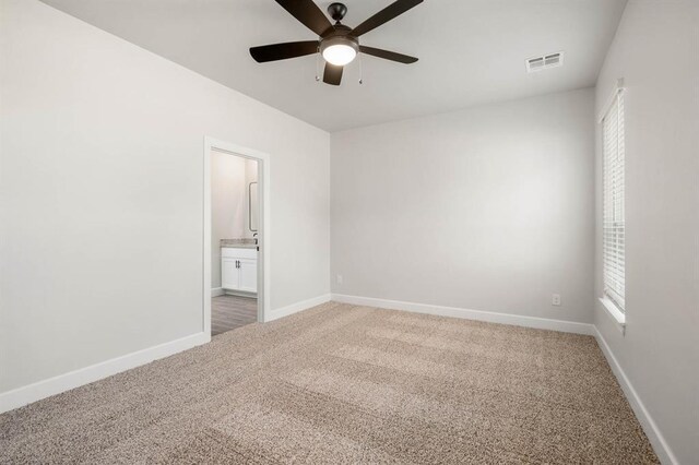 2375 Clubhouse Dr, Blanchard, OK 73010 - carpeted spare room with visible vents, a ceiling fan, and baseboards