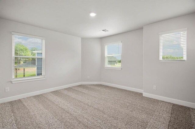 2375 Clubhouse Dr, Blanchard, OK 73010 - carpeted empty room featuring baseboards and visible vents