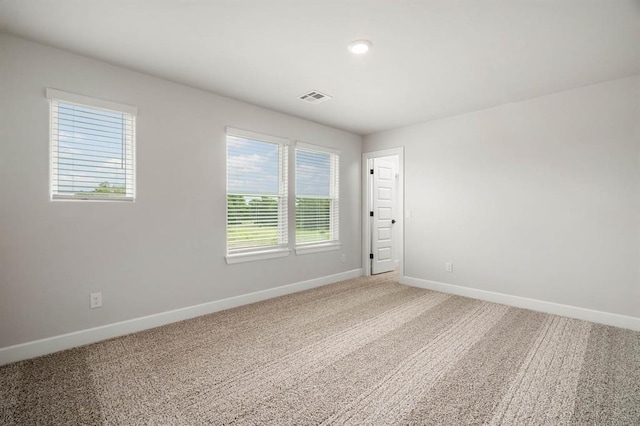 2375 Clubhouse Dr, Blanchard, OK 73010 - unfurnished room featuring baseboards, light colored carpet, recessed lighting, and visible vents
