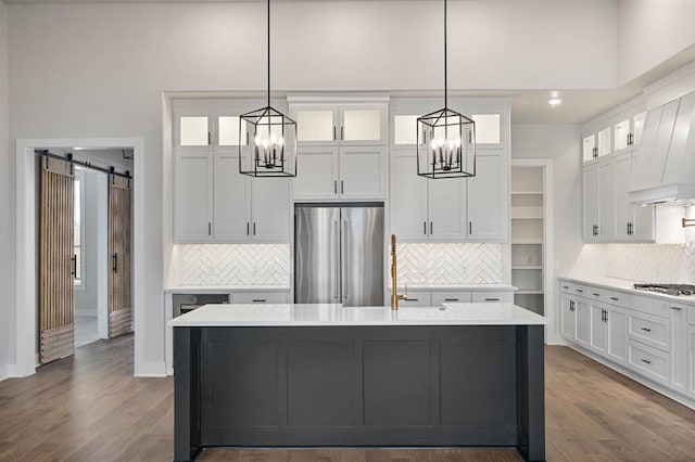2217 Winter Creek Blvd, Blanchard, OK 73010 - kitchen featuring decorative backsplash, a notable chandelier, and stainless steel fridge