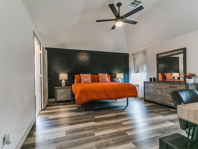 11021 SW 35th Ter, Yukon, OK 73099 - bedroom with wood finished floors, lofted ceiling, and ceiling fan