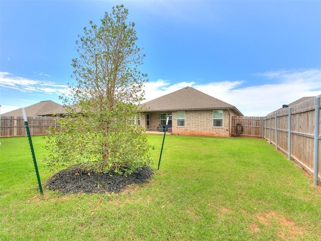 11021 SW 35th Ter, Yukon, OK 73099 - back of house with brick siding