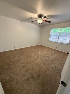 117 Phillips Ln, Clinton, OK 73601 - carpeted spare room featuring ceiling fan
