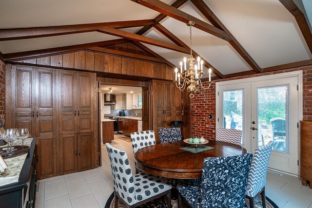 3324 S Husband St, Stillwater, OK 74074 - dining room with light tile patterned flooring and brick wall