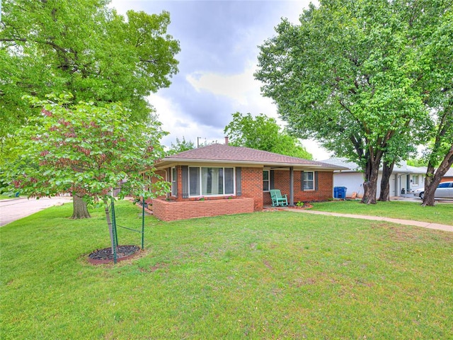 2429 Barclay Rd, Oklahoma City, OK 73120 - single story home featuring a front yard and brick siding