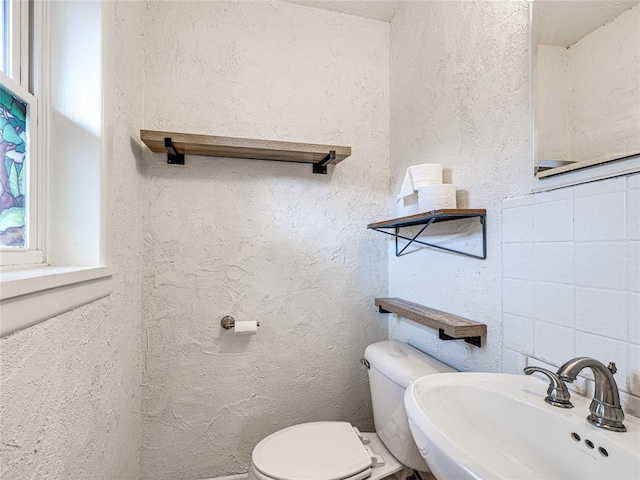 2429 Barclay Rd, Oklahoma City, OK 73120 - bathroom featuring a sink and toilet