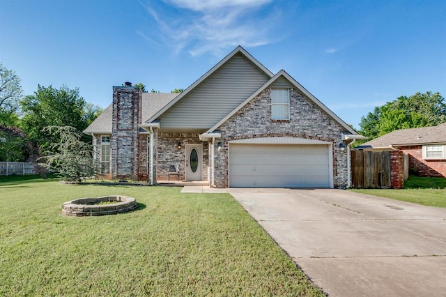 view of front of property featuring fence, an attached garage, a front yard, a chimney, and driveway