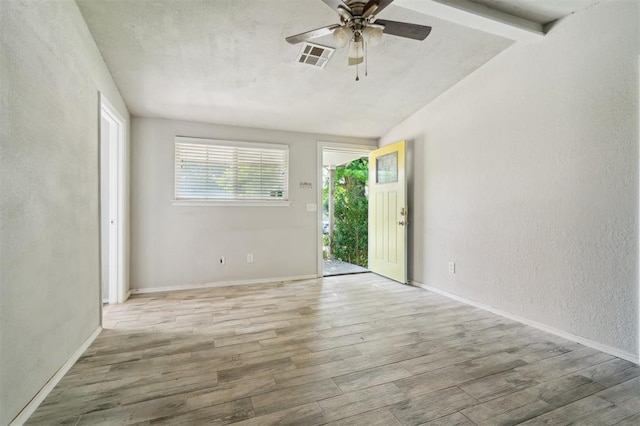 1662 NE 6th St, Moore, OK 73160 - spare room with wood finished floors, a ceiling fan, and baseboards