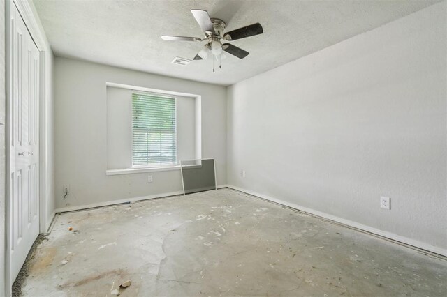 1662 NE 6th St, Moore, OK 73160 - unfurnished bedroom with baseboards and a ceiling fan