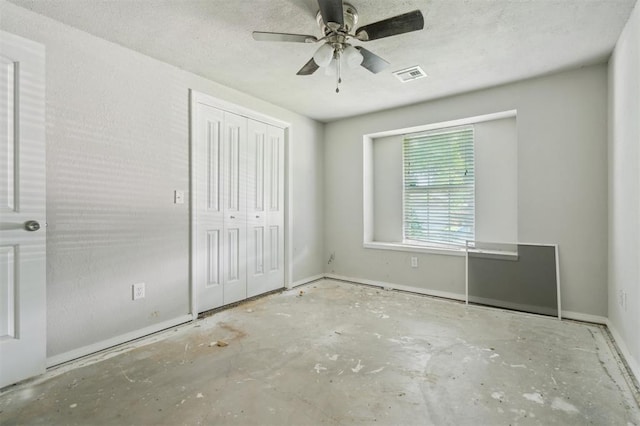 1662 NE 6th St, Moore, OK 73160 - unfurnished bedroom featuring a closet, ceiling fan, and baseboards