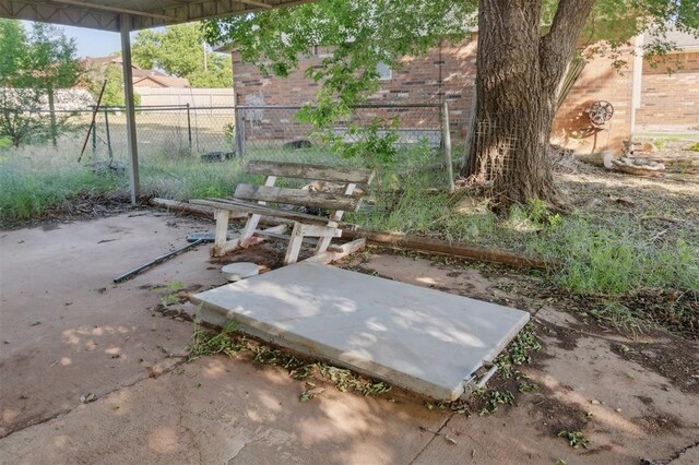 1662 NE 6th St, Moore, OK 73160 - view of patio / terrace with fence