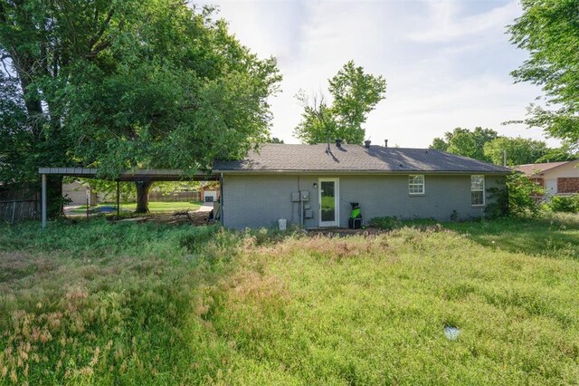 1662 NE 6th St, Moore, OK 73160 - back of house featuring brick siding