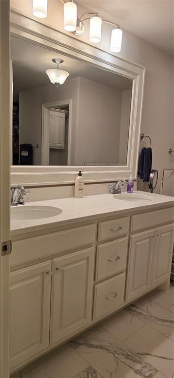 18812 Trailview Way, Edmond, OK 73012 - full bathroom featuring double vanity, a sink, and marble finish floor