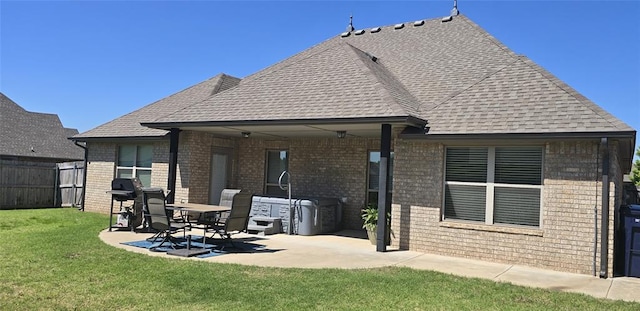 18812 Trailview Way, Edmond, OK 73012 - rear view of property with brick siding, a patio area, fence, and roof with shingles