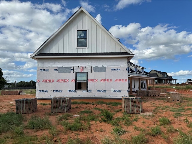 920 Hidden View Acres Dr, Blanchard, OK 73010 - view of property exterior featuring board and batten siding and a central AC unit