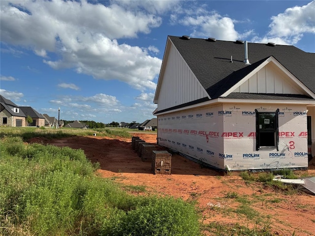 920 Hidden View Acres Dr, Blanchard, OK 73010 - view of property exterior featuring a shingled roof and board and batten siding