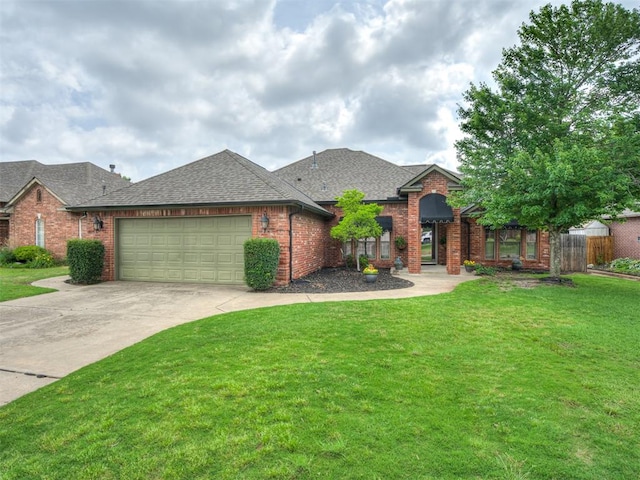 10812 S Miller Ave, Oklahoma City, OK 73170 - view of front facade featuring a shingled roof, brick siding, an attached garage, and concrete driveway