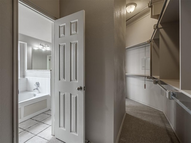 10812 S Miller Ave, Oklahoma City, OK 73170 - walk in closet with tile patterned floors