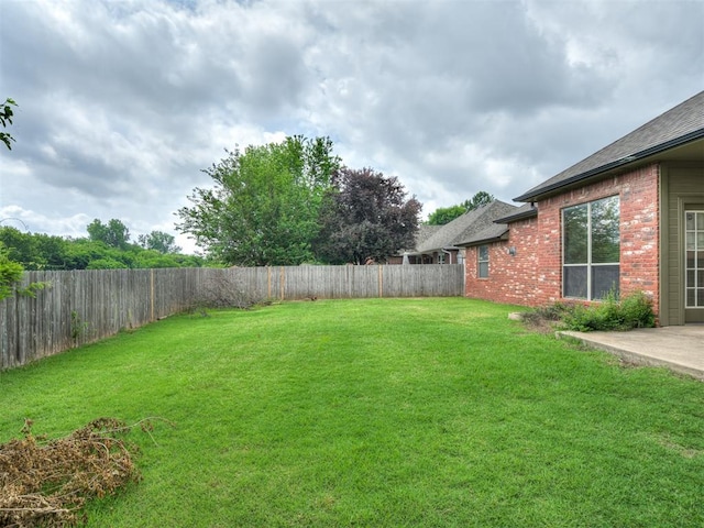 10812 S Miller Ave, Oklahoma City, OK 73170 - view of yard with a patio area