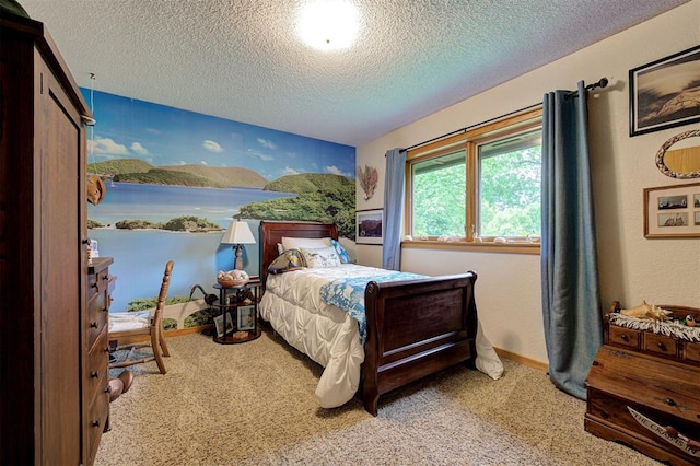 carpeted bedroom featuring a textured ceiling and baseboards