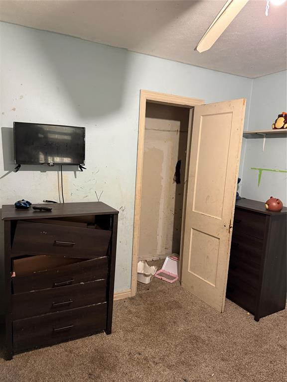 902 S Hitchite St, Wewoka, OK 74884 - bedroom featuring carpet floors