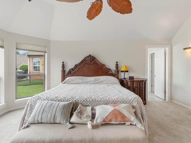 bedroom featuring vaulted ceiling, carpet, and baseboards