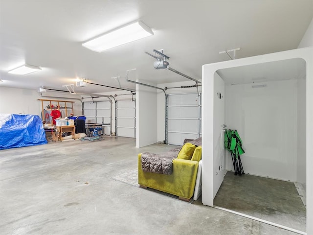 garage featuring a garage door opener