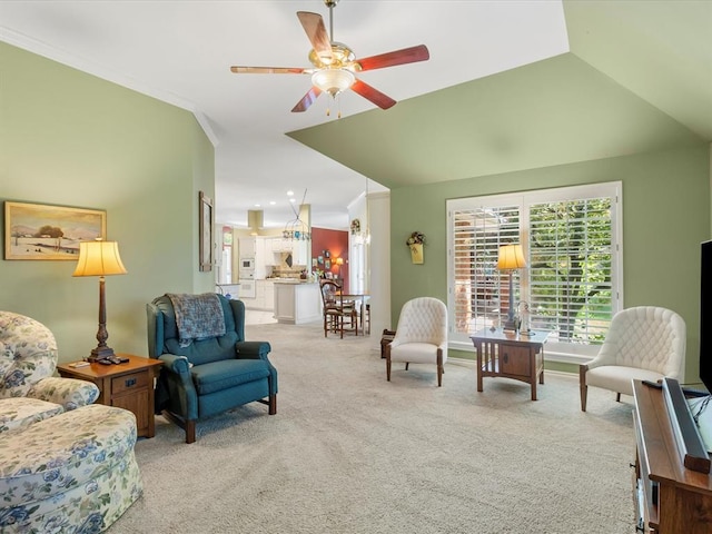 living room featuring a ceiling fan and carpet