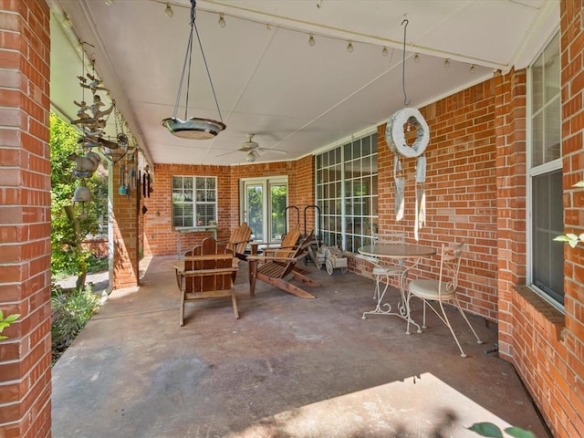 view of patio / terrace featuring ceiling fan