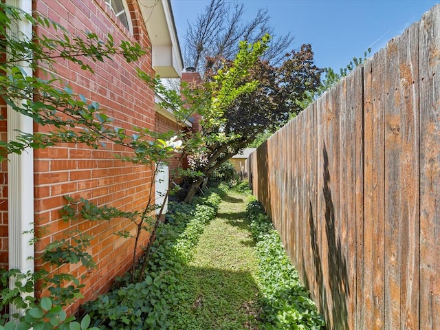 view of yard with fence