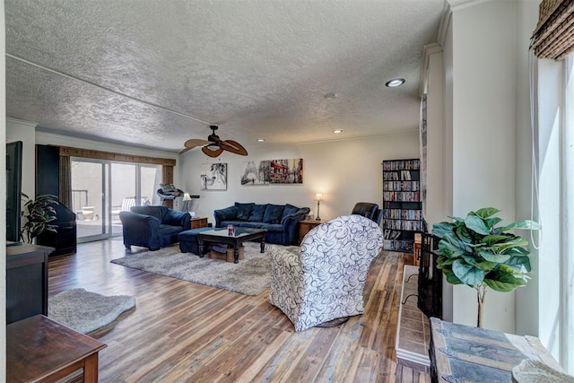 6000 N Pennsylvania Ave Unit 59, Oklahoma City, OK 73112 - living area with a ceiling fan, recessed lighting, a textured ceiling, and wood finished floors
