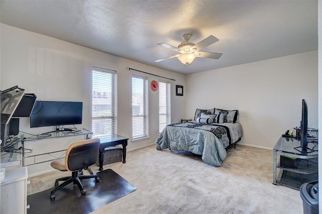 6000 N Pennsylvania Ave Unit 59, Oklahoma City, OK 73112 - bedroom with carpet floors, baseboards, and ceiling fan