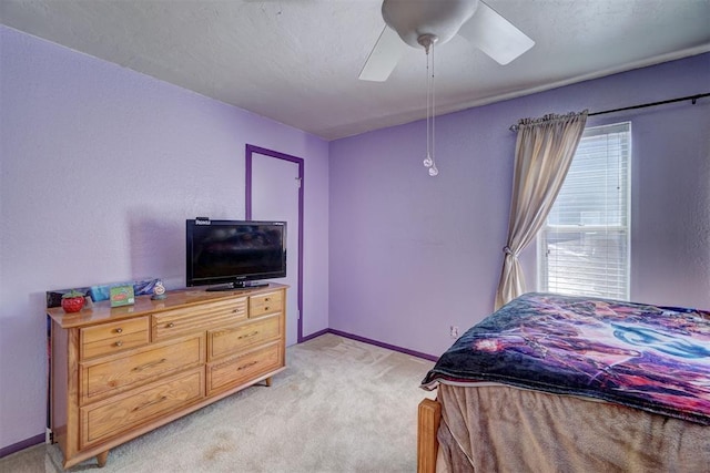 6000 N Pennsylvania Ave Unit 59, Oklahoma City, OK 73112 - bedroom featuring light colored carpet, baseboards, and ceiling fan