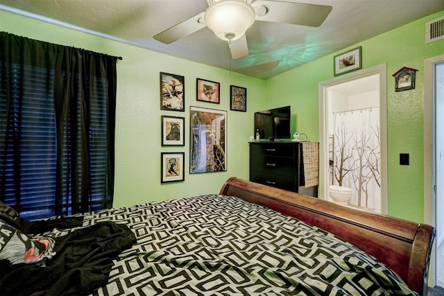 6000 N Pennsylvania Ave Unit 59, Oklahoma City, OK 73112 - bedroom with a ceiling fan and a textured wall