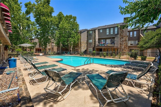 6000 N Pennsylvania Ave Unit 59, Oklahoma City, OK 73112 - community pool featuring a patio area and fence