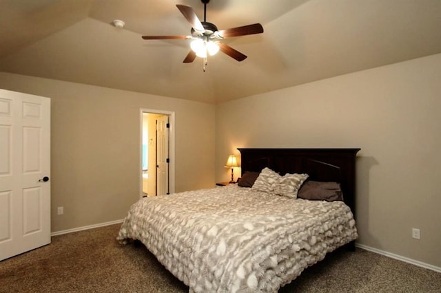 bedroom featuring carpet, vaulted ceiling, baseboards, and ceiling fan
