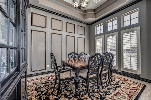 8521 NW 124th St, Oklahoma City, OK 73142 - dining room with a chandelier, a high ceiling, and baseboards