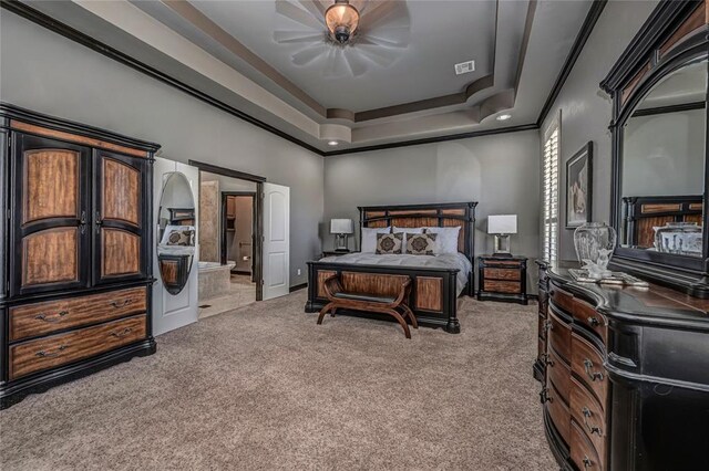 8521 NW 124th St, Oklahoma City, OK 73142 - bedroom featuring carpet flooring, a raised ceiling, ensuite bathroom, crown molding, and baseboards