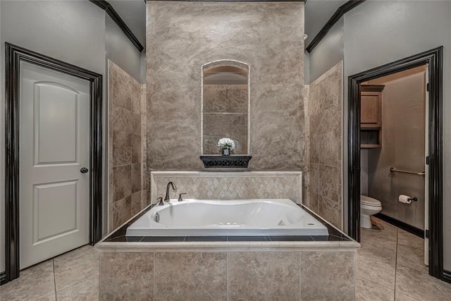 8521 NW 124th St, Oklahoma City, OK 73142 - bathroom with toilet, a garden tub, ornamental molding, and tile patterned flooring