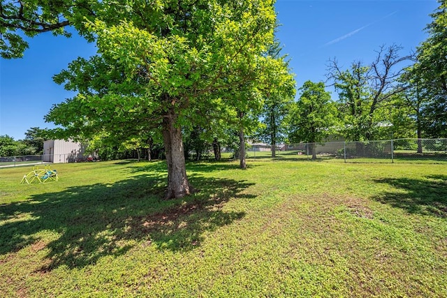 view of yard featuring fence