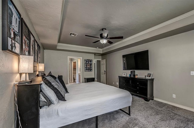 bedroom with visible vents, baseboards, ceiling fan, a raised ceiling, and carpet flooring