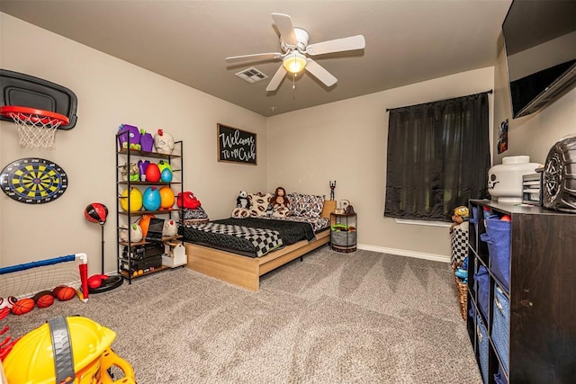 bedroom with carpet flooring, a ceiling fan, baseboards, and visible vents
