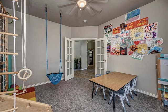 recreation room with baseboards, ceiling fan, carpet, and french doors
