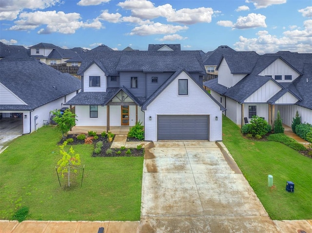 modern farmhouse with a residential view, covered porch, a shingled roof, and concrete driveway