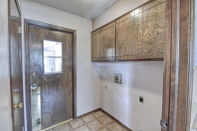 204 Sequoia Park Dr, Yukon, OK 73099 - clothes washing area with light floors, baseboards, hookup for a washing machine, hookup for an electric dryer, and cabinet space