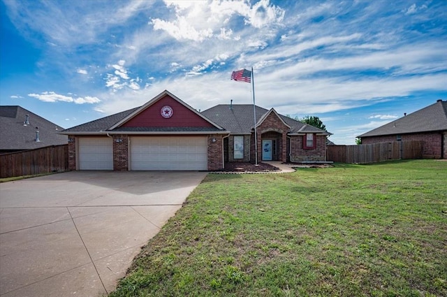 view of front of house with driveway, a garage, brick siding, fence, and a front lawn