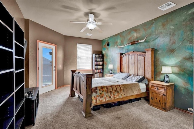bedroom with baseboards, access to outside, carpet flooring, and visible vents