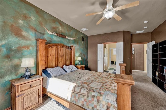 bedroom featuring visible vents, carpet flooring, and ceiling fan