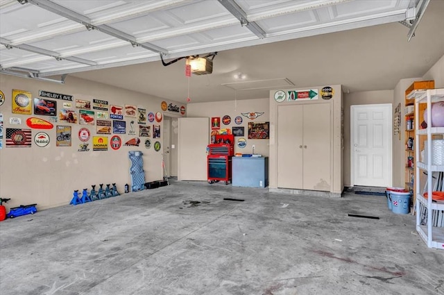 garage featuring a garage door opener