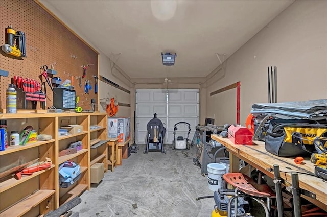 garage featuring a workshop area and a garage door opener